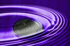 euro coin wave water stone