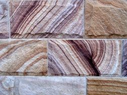 sandstone wall red lines rock