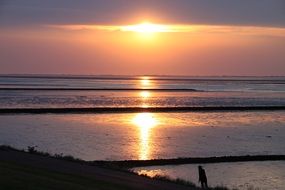 sunset beach north sea wallpaper