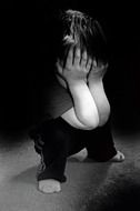 black and white picture of a sad boy
