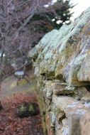 stone fence old weathered aged