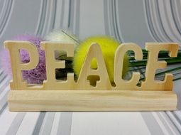 wood peace inscription