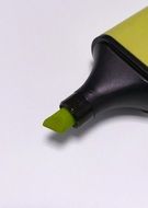green office highlighter left open on the paper