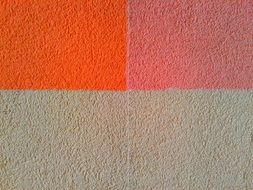 background with beige, orange and red wall texture