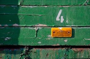 green wooden wall of a trailer