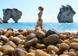 sexy model posing on the beach