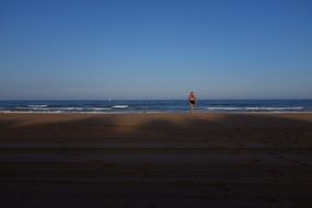 fantastically beautiful woman on the beach