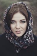 caucasian young girl in headscarf outdoor