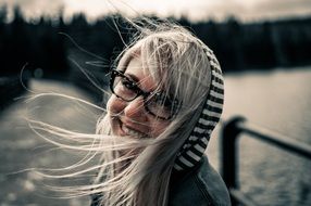 blonde in glass girl smiling