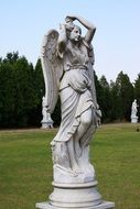 statue of a woman in a park in Korea