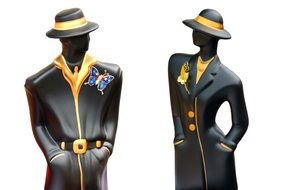 female sculptures in fashionable clothes