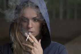 woman smoking cigarette