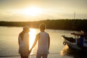 couple in love on the lake at dusk