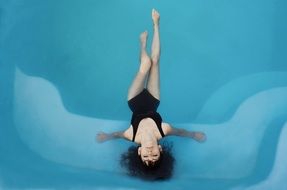 woman in swimsuit in the swimming pool