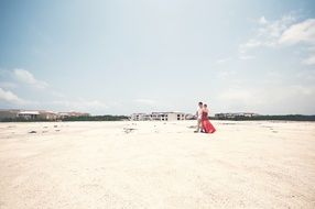 couple in love walks on the beach