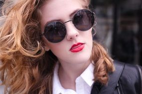 beautiful girl with sunglasses and cool makeup