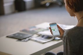 woman watching cell phone person mobile