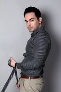photo of handsome man in elegant clothes