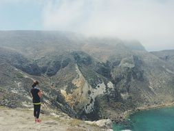 man on the edge of the cliff