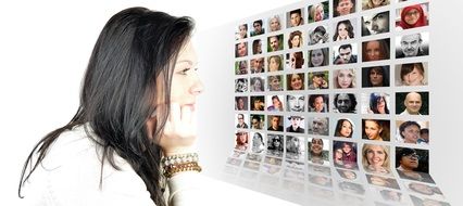 woman looks at pictures