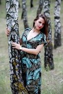 young woman at the tree