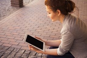 tablet computer woman reading