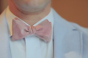 Man is wearing the bow-tie