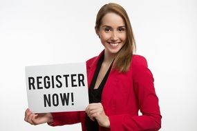 Smiling woman with register now sign