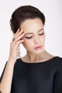 fashion model in black dress with pink lips