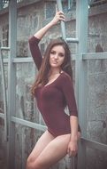 girl with long hair posing outdoors