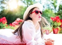 young girl on a blanket in summer