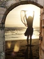 silhouette of a girl at the gate of the castle