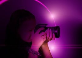 photographer with camera on purple background