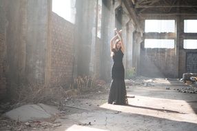 asian woman posing in black dress