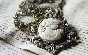 beautiful female medallion on a chain
