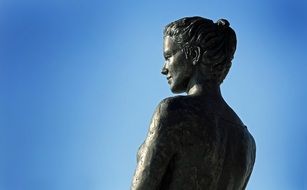 bronze sculpture of a woman