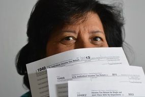 taxes bills 1040 adult woman incomes