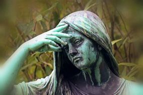 sculpture of a mourning woman