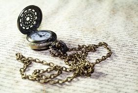 old pocket watch on a chain