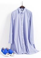 light women's shirt and blue shoes