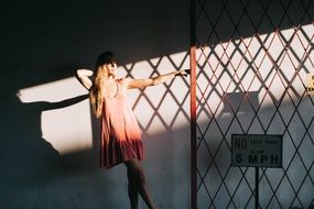 model posing in sun rays