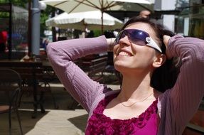 happy girl outdoors in sunglasses