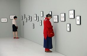 Women are on art exhibition