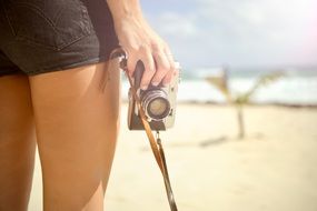 girl with camera vintage hand leg skin
