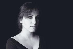 black and white photo of a model with makeup