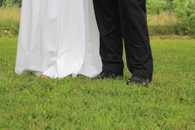 photo of the feet of the newlyweds