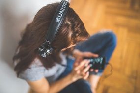 incredibly beautiful girl in headphones