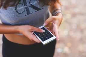 girl moving her finger on touchscreen