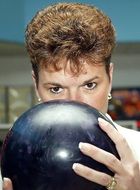 woman playing bowling