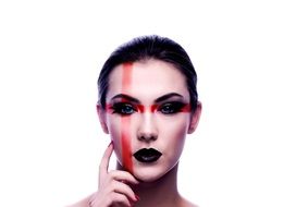 red cross painted young woman face